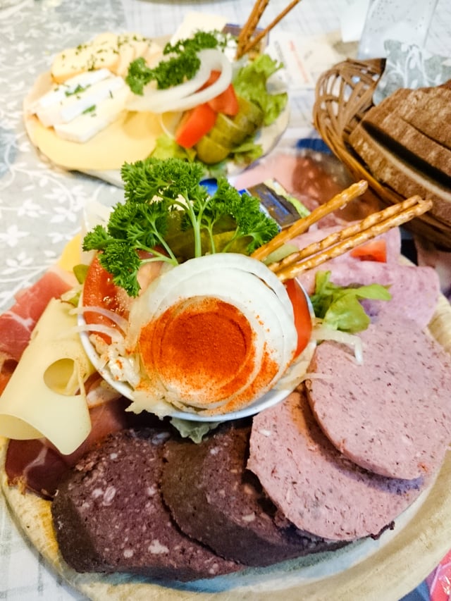 Plate of German sausage: Jagdwurst, liver sausage, blood sausage, Westphalian ham