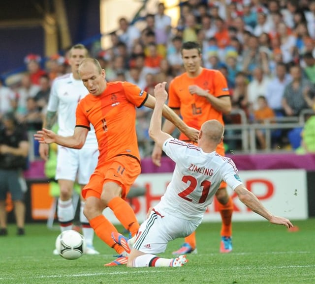 Dutch star football players Arjen Robben and Robin van Persie during a game with the Netherlands national football team against Denmark national football team at Euro 2012