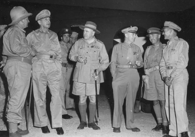 Senior Allied commanders in New Guinea in October 1942. Left to right: Mr Frank Forde (Australian Minister for the Army); MacArthur; General Sir Thomas Blamey, Allied Land Forces; Lieutenant General George C. Kenney, Allied Air Forces; Lieutenant General Edmund Herring, New Guinea Force; Brigadier General Kenneth Walker, V Bomber Command.