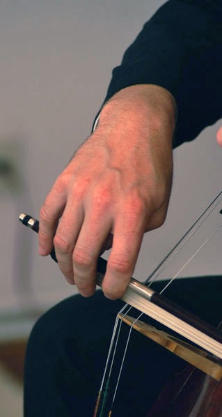 A cello French bow sul ponticello