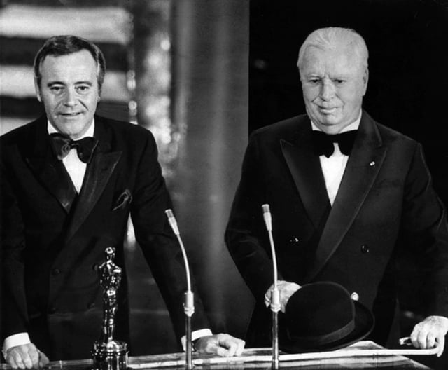 Chaplin (right) receiving his Honorary Academy Award from Jack Lemmon in 1972. It was the first time he had been to the United States in 20 years.