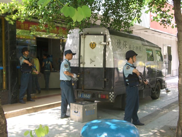 Cash in transit van with a crew of security guards in Guangzhou, China