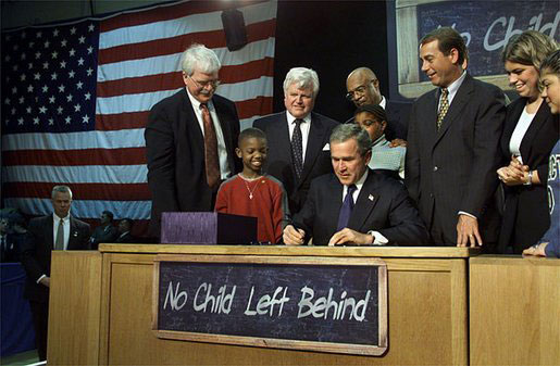 President Bush signing the No Child Left Behind Act into law, January 8, 2002