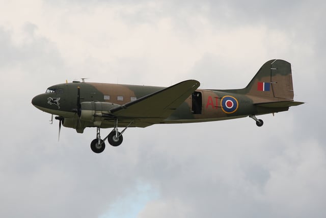 A Battle of Britain Memorial Flight Dakota with open parachute door at Duxford in 2008