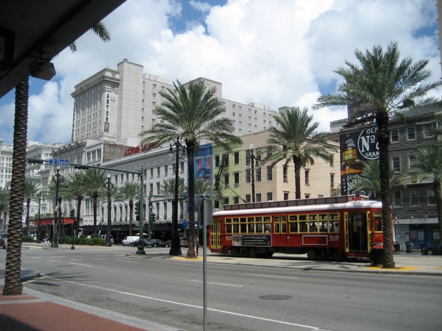 A New Orleans streetcar traveling down Canal Street