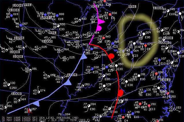 Surface map on the morning of May 31, 1985. Note the "triple-point" moving east toward southern Ontario