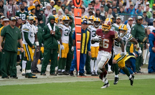 Alexander in a game against Adrian Peterson and the Washington Redskins