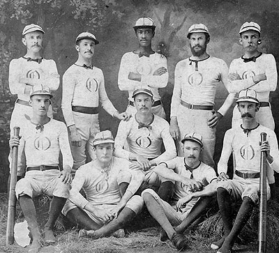 A baseball team and its uniforms in the 1870s. Note that the team is integrated, in contrast to 20th century MLB, which was segregated until 1947.