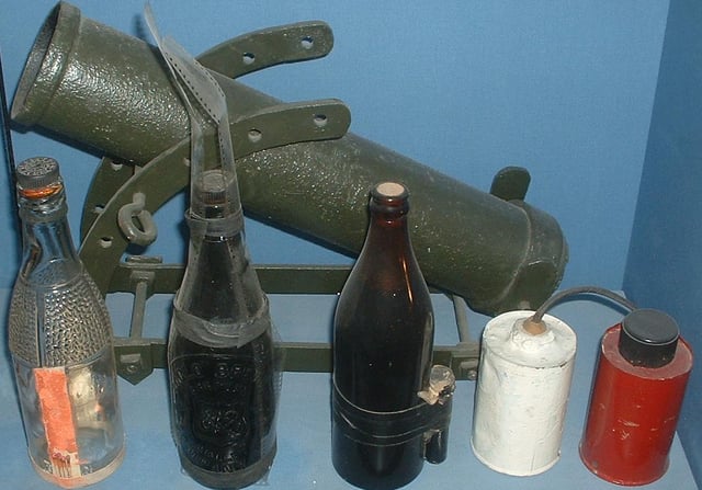 British Home Guard improvised weapons in Imperial War Museum, London. The transparent strips attached to the middle bottle are likely to be inflammable celluloid film.