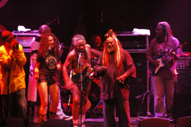 Funk places most of its emphasis on rhythm and groove, with entire songs based around a vamp on a single chord. Pictured are the influential funk musicians George Clinton and Parliament Funkadelic in 2006.