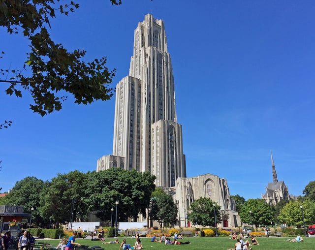 The lower campus, the traditional heart of the university, is typified by Gothic Revival architecture including Heinz Chapel (right) and the Stephen Foster Memorial (center foreground), but the 42-story Cathedral of Learning dominates most views across the Oakland neighborhood.