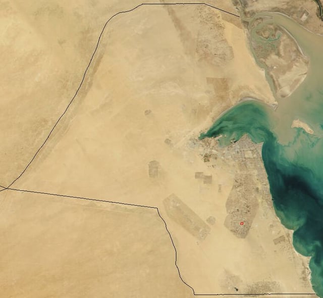 A satellite image of Kuwait reveals its desert topography.