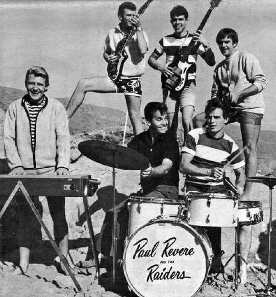 Where the Action Is photo of Dick Clark with the group in 1966. Front L–R: Paul Revere, Clark, and Mike Smith. Back L–R: Drake Levin, Phil Volk, and Mark Lindsay.