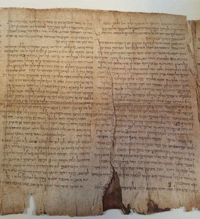 While in Jericho, Origen bought an ancient manuscript of the Hebrew Bible which had been discovered "in a jar", a discovery which prefigures the later discovery of the Dead Sea Scrolls in the twentieth century. Shown here is a section of the Isaiah scroll from Qumran.