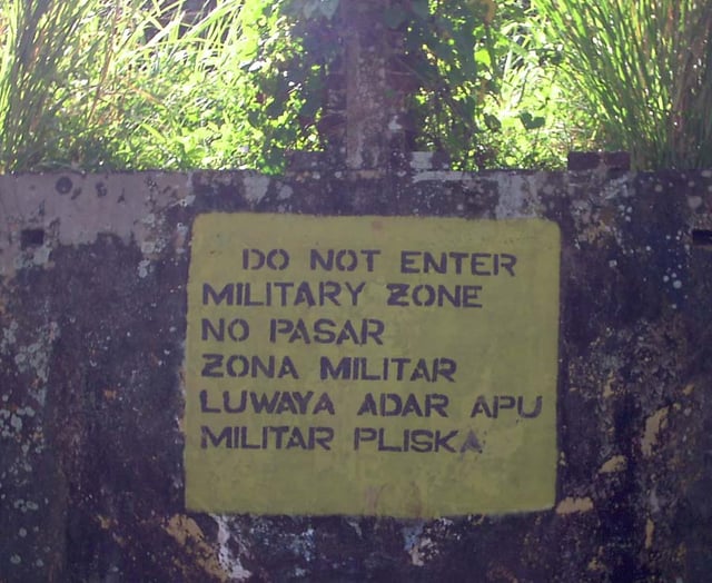 A sign in Bluefields in English (top), Spanish (middle) and Miskito (bottom)