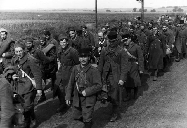 French prisoners are marched into internment.
