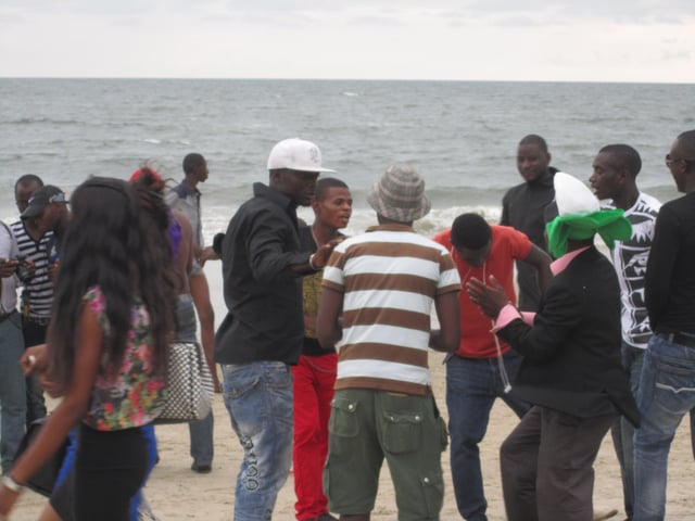 Crowd on beach in Gabon