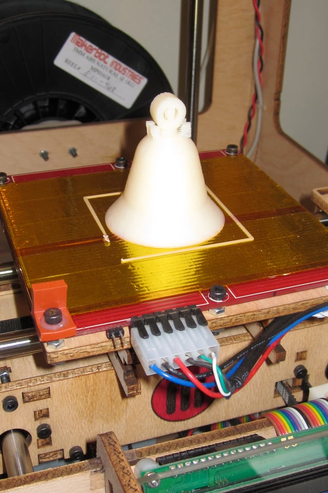 A naturally colored ABS 3D bell manufactured with a 3D printer
