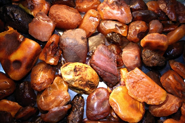 Unpolished amber stones, in varying hues