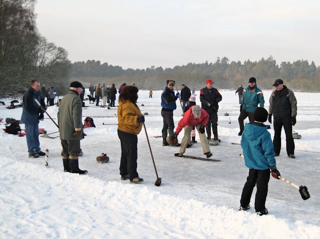 Outdoor curling on Stormont Loch. The stone is delivered from an iron crampit rather than the hack used indoors