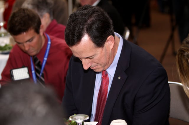 Rick Santorum at prayer, 2012