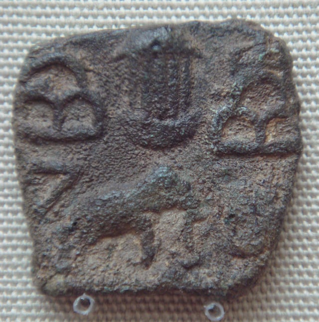 Pandya coin with temple between hills and elephant (Sri Lanka -1st century CE).