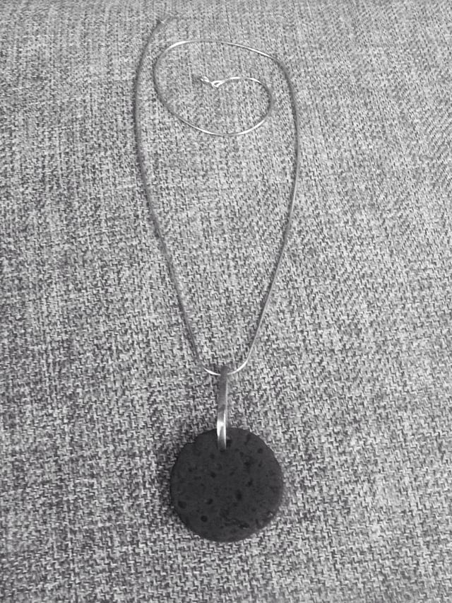 A necklace made from the ash of the 2010 eruption: Jewellery and similar memorabilia of the eruption are now sold in Iceland.