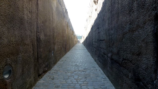 Symbolic "death road" (portion of the memorial in Bełżec). Under the ground passage built in place of former "Sluice" into the gas chambers, evokes the feelings of no escape