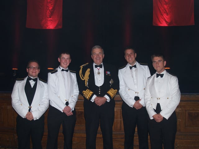An example of Merchant Navy Officers, graduating at their 'passing out' ceremony from Warsash Maritime Academy in Southampton, with Former First Sea Lord Alan West, Baron West of Spithead, in 2011.