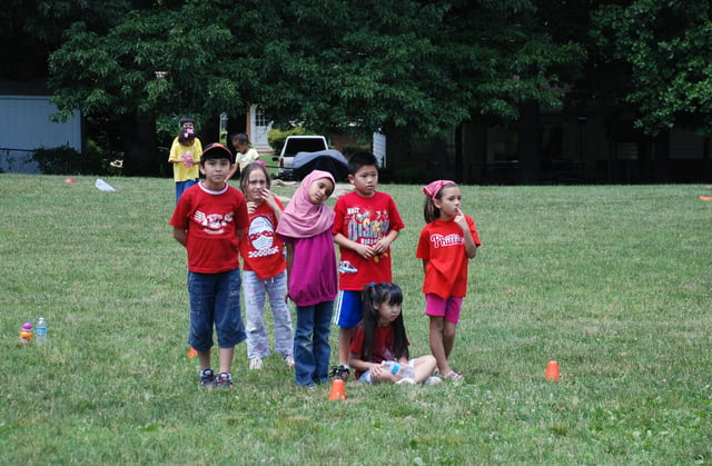 Children play frisbee baseball at one of Fairfax County's elementary schools.