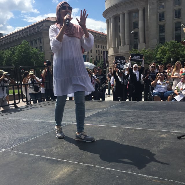 Sarsour speaking at a protest against President Donald Trump.