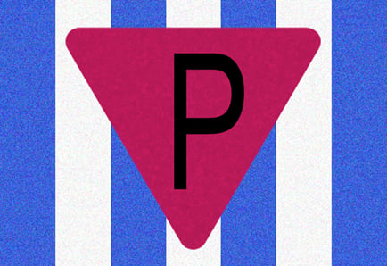 The camp badge for non-Jewish Polish political prisoners