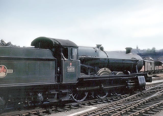 Great Western Railway No. 6833 Calcot Grange, a 4-6-0 Grange class steam locomotive at Bristol Temple Meads station. Note the Belpaire (square-topped) firebox.