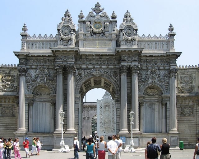 Dolmabahçe Palace, the first European-style palace in Istanbul, was built by Abdulmejid between 1843 and 1856, at a cost of five million Ottoman gold pounds, the equivalent of 35 tons of gold. Fourteen tons of gold was used to adorn the interior ceiling of the palace. The world's largest Bohemian crystal chandelier, a gift from Queen Victoria, is in the centre hall. The palace has the largest collection of Bohemian and Baccarat crystal chandeliers in the world, and even the staircases are made of Baccarat crystal.