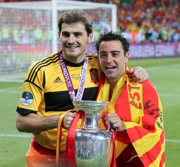 Xavi and Spain captain Iker Casillas with the Euro 2012 trophy