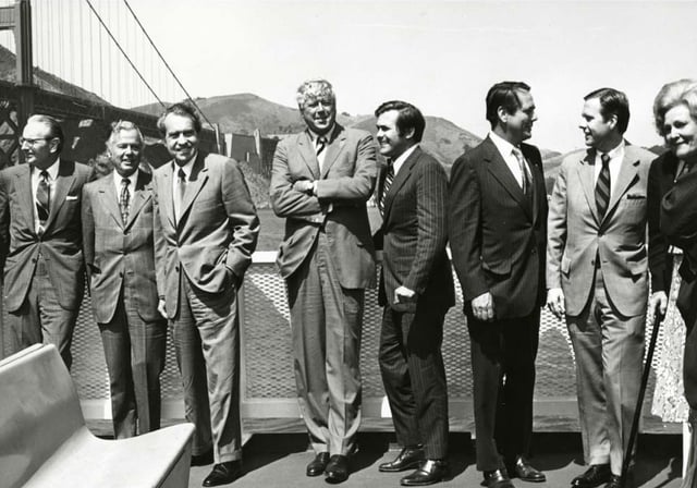 Mayor Wilson (second from right) with U.S. President Richard Nixon, First Lady Pat Nixon, and others including Interior Secretary Rogers C.B. Morton and Counselor to the President Donald Rumsfeld in front of the Golden Gate Bridge, September 1972