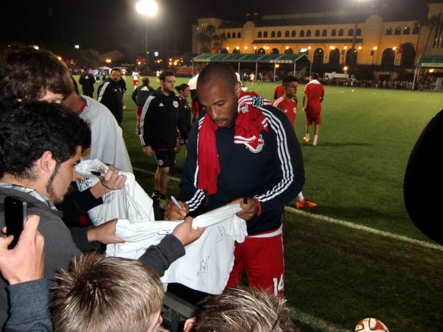 Henry signing autographs in February 2014.