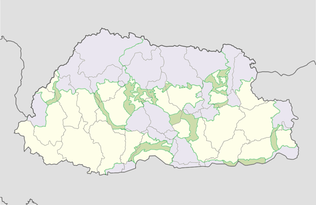 Protected areas of Bhutan in lavender; biological corridors in green.