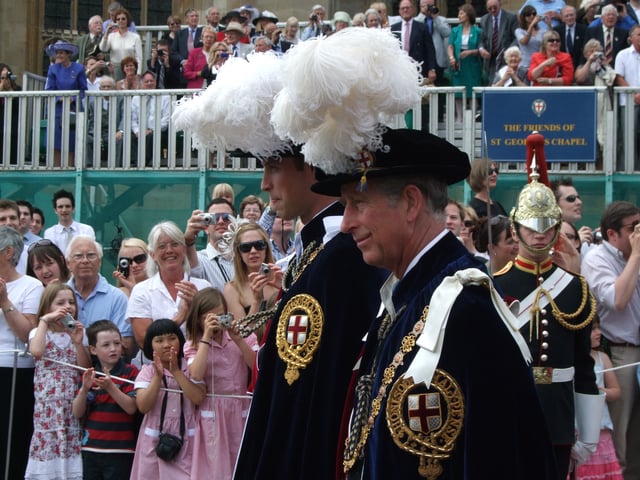Accompanied by his father, Prince William proceeds to St George's Chapel, Windsor to be installed as a Knight of the Garter.