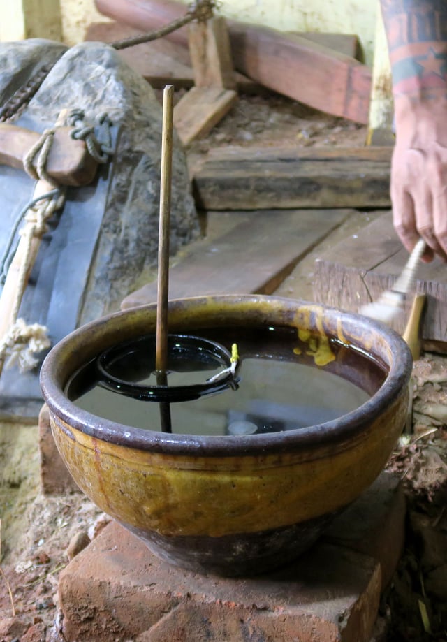 A water clock for goldbeating goldleaf in Mandalay (Myanmar).