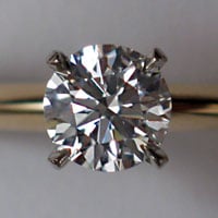 A round brilliant cut diamond set in a ring