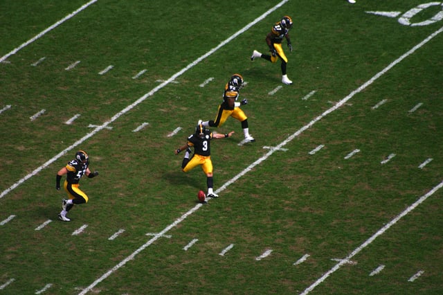 Kicker Jeff Reed of the Pittsburgh Steelers executes a kickoff