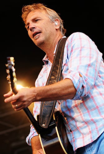 Costner on stage in July 2010