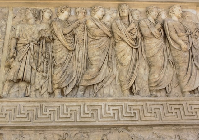 A common mixture of high and low relief, in the Roman Ara Pacis, placed to be seen from below. Low relief ornament at bottom