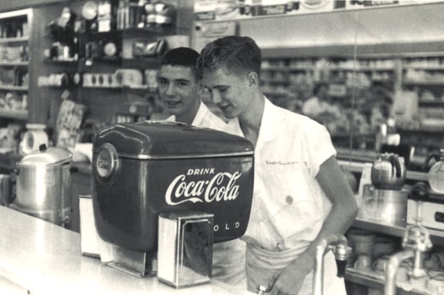 Claimed to be the first installation anywhere of the 1948 model "Boat Motor" styled Coca-Cola soda dispenser, Fleeman's Pharmacy, Atlanta, Georgia.