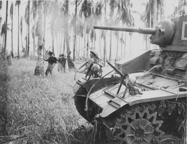 Australian forces attack Japanese positions during the Battle of Buna–Gona, 7 January 1943.