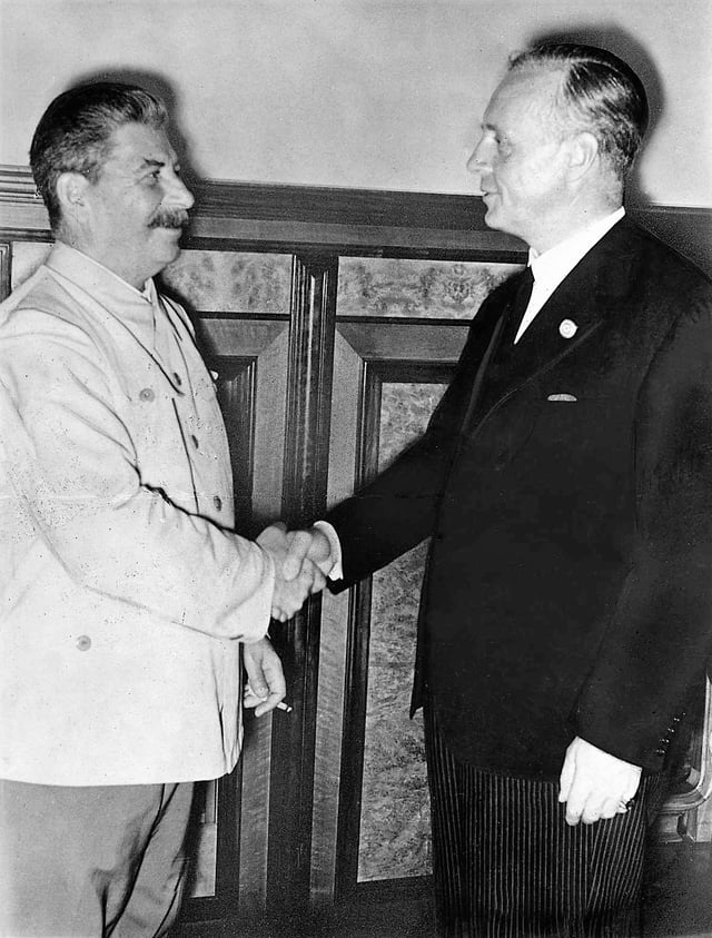 German Foreign Minister Joachim von Ribbentrop (right) and the Soviet leader Joseph Stalin, after signing the Molotov–Ribbentrop Pact, 23 August 1939
