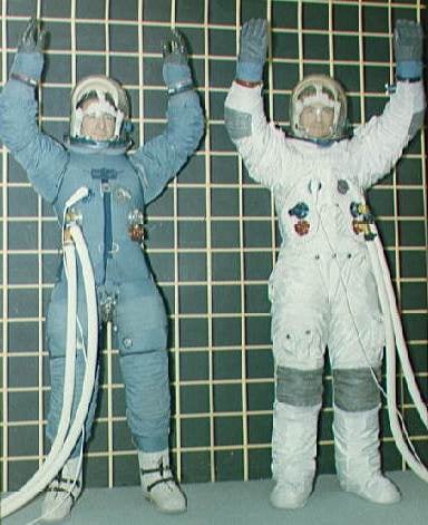 The Block II spacesuit in January 1968, before (left) and after changes recommended after the Apollo 1 fire