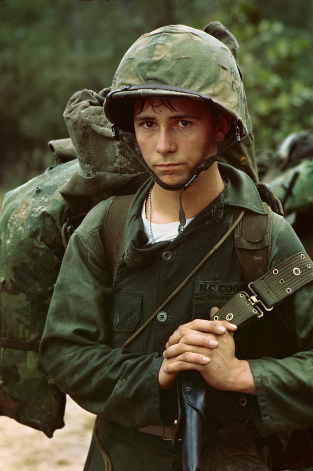 A young Marine private waits on the beach during the Marine landing, Da Nang, 3 August 1965