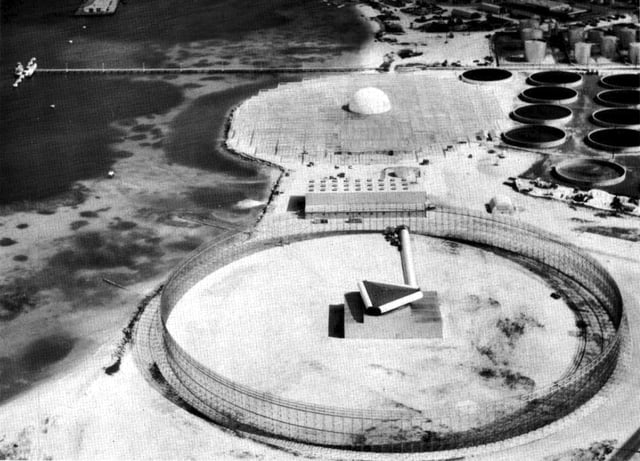 The Zeus Acquisition Radar's triangular transmitter is in the foreground, with the dome covered receiver in the background.